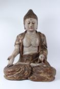 A LARGE CARVED WOOD AND POLYCHROME PAINTED SEATED FIGURE OF BUDDHA, late Ming / Qing dynasty,
