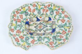 A TURKISH KUTAHYA CERAMIC SHAVING BOWL. 34cms long.