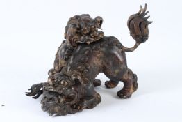 A GOOD BRONZE FOO DOG CENSER with loose head. 40cms long.