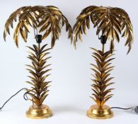 A PAIR OF GILT METAL PALM TREE SHAPED TABLE LAMPS.