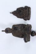 A RARE SMALL LEATHER DEITY or MONK. 19th Century TIBETAN, with tassel, 12cms high, and a MONK,