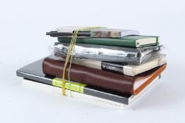 A GROUP OF SEVEN HERMES AND OTHER NOTEBOOKS.