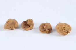 FOUR JAPANESE CARVED BONE NETSUKES.