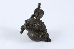 A JAPANESE BRONZE TOAD with mount. 8cms high.