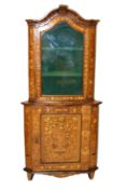 AN 18TH CENTURY / 19TH CENTURY WALNUT AND FLORAL MARQUETRY INLAID STANDING CORNER CABINET, with an