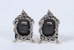 A PAIR OF SILVER MINI FRAMES.