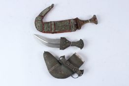 TWO ARAB DAGGERS / KHANJARS. 26cms and 30cms long.