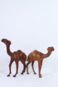 TWO LIBERTY OF LONDON LEATHER CAMELS. 36cms and 30cms high.