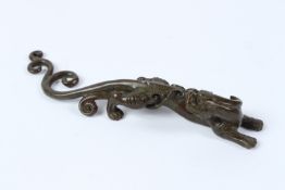 AN ORIENTAL OKIMONO BRONZE DRAGON. 17cms tall.