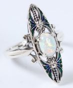 A SILVER OPAL AND ENAMEL ART NOUVEAU STYLE DRAGONFLY RING.