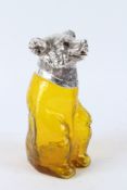 A YELLOW GLASS BEAR SHAPE CLARET JUG WITH PLATED MOUNTS. 22cms high.