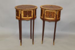 A PAIR OF FRENCH STYLE MARQUETRY INLAID OVAL THREE DRAWER BEDSIDE TABLES. 2ft 3.5ins high x 1ft 4ins
