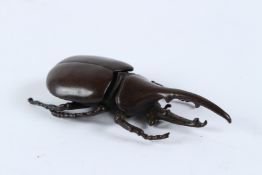 A JAPANESE BRONZE ARTICULATED BEETLE.