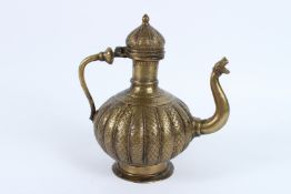 AN 18TH - 19TH CENTURY MUGHAL INDIAN BRASS OR BRONZE EWER. 26cms high.