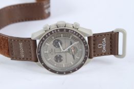 AN OMEGA / SWATCH SPEEDMASTER MOONWATCH 