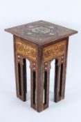 A 19TH CENTURY OTTOMAN TURKISH INLAID WOODEN TABLE. 46cms high.