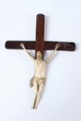 A WOOD AND CARVED BONE CRUCIFIX, possibly 17th / 18th century. 20cms long x 15cms wide.