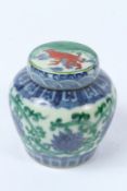 A CHINESE DOUCAI GINGER JAR AND COVER. 11cms.