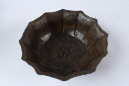 AN ISLAMIC, POSSIBLY PERSIAN, SILVER INLAID BRASS BOWL. 20cms diameter.
