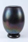 ANTHONY STERN. A large dark iridescent heavy glass vase, engraved signature to the base. 30cms