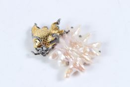 A SILVER GILT FISH BAROQUE PEARL PENDANT.