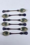 A SET OF SIX FINE ISLAMIC STYLE, POSSIBLY SWISS FOR OTTOMAN MARKET, ENAMELLED GOLDEN SPOONS. 17cms