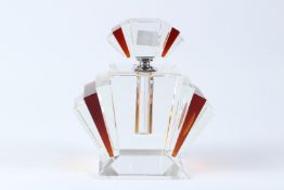 A LARGE ART DECO STYLE AMBER TINTED GLASS SCENT BOTTLE. 22cms.