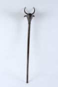 A 19TH CENTURY QAJAR STEEL MACE IN THE FORM OF A BULL, Sufi Manner, Persia. 80cms long.
