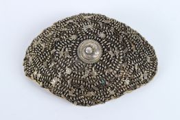 A VERY FINE 19TH CENTURY INDIAN OR SOUTH EAST ASIAN WHITE METAL BELT BUCKLE. 10cms long.