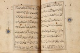 A COMPLETE ILLUMINATED 15TH CENTURY TIMURID QURAN, PERSIA.