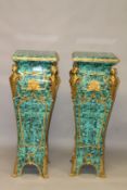 A PAIR OF LARGE IMPRESSIVE FAUX MALACHITE PEDESTALS, with ornate ormolu mounts. 4ft 0ins x 1ft