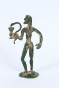 AN ANCIENT BRONZE SCULPTURE, STANDING MAN with green patina. 15cms high.