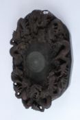 A LARGE JAPANESE BRONZE OVAL DRAGON INKSTONE. 55cms x 35cms.