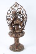 A GOOD LARGE CHINESE BRONZE DEITY WITH HALO. 75cms high.