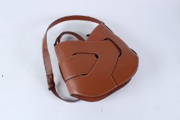 A POLENE TAN LEATHER LATTICEWORK DESIGN SHOULDER BAG. 29cms wide.