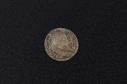 A silver Roman style coin.