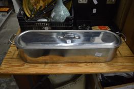 A stainless steel fish kettle.