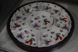 A Chinese butterfly decorated porcelain hors-d'oeuvre set in Lazy Susan style fitted box.