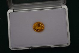 A 7.5ct oval natural golden citrine.