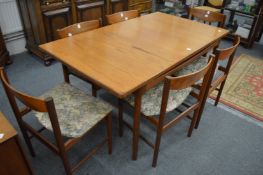 A G Plan extending table with six chairs.