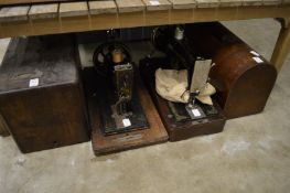 Two old sewing machines.