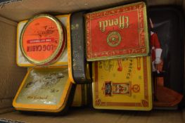 Old tobacco and other tins.