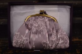 A Liberty of London evening bag with original box.