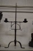 Wrought iron twin branch candle stand.