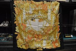 A Salvatore Ferragamo scarf decorated with a tiger.