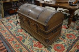 A large German metal bound oak dome topped chest.