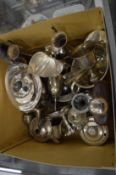A box of mixed silverware.