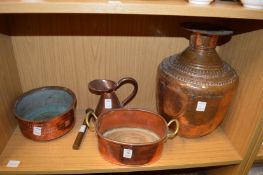 A group of copper items.