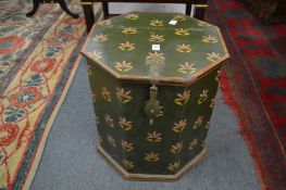 A decoratively painted octagonal shaped storage box.