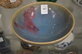 A Chinese Jun glazed circular bowl.